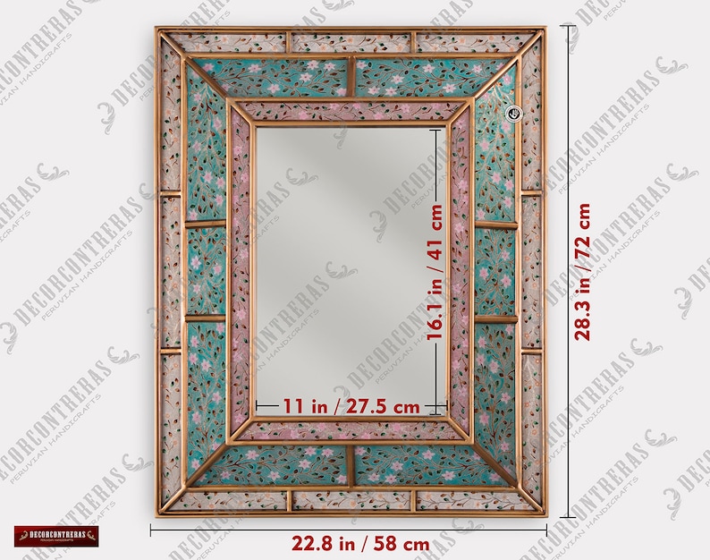 May include: A decorative mirror with a gold frame and a mosaic of pink and blue floral patterns. The mirror measures 28.3 inches by 16.1 inches.