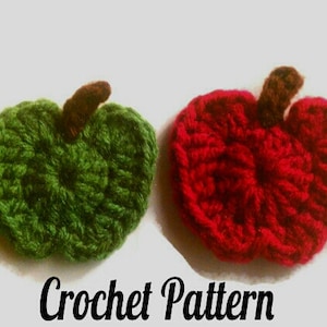 May include: Two crocheted apples, one green and one red, with brown stems. Crochet pattern.