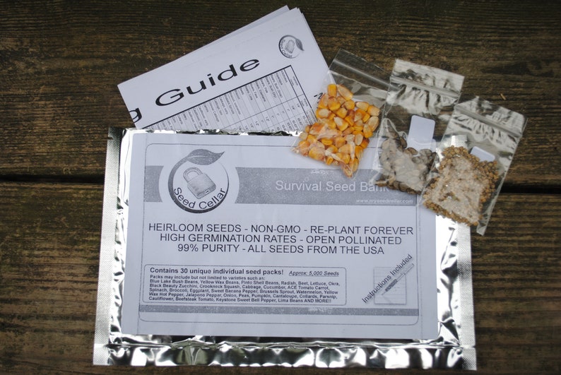 May include: A silver foil pouch containing a survival seed bank with 30 unique individual seed packs. The pouch includes a guide with the text "Seed Cellar" and "Survival Seed Bank". The text on the guide also states "Heirloom Seeds - Non-GMO - Re-Plant Forever - High Germination Rates - Open Pollinated - 99% Purity - All Seeds From The USA".