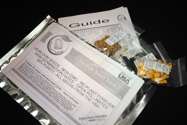 May include: A silver resealable bag containing 30 individual seed packets. The bag is labeled "Heirloom Seeds - Non-GMO - Re-Plant Forever" and "Survival Seed Bank". The bag also includes a guide with instructions. The seed packets are labeled with the type of seed, such as "Corn, Yellow D".