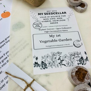 May include: A white canvas bag with a brown paper pot and three peat pots. The bag has a label that says "My Seed Cellar" and "My 1st Vegetable Garden".