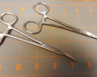 HEMOSTATS: For Twining Craft Grade self-locking Hemostats, One each of a Straight  Jaw and a Curved Jaw.