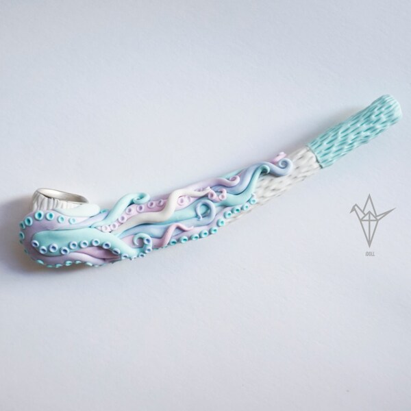 Pipe with pastel blue tentacles.