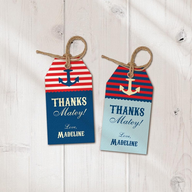 May include: Two red, white and blue striped gift tags with a gold anchor and the text "Thanks Matey! Love, Madeline".