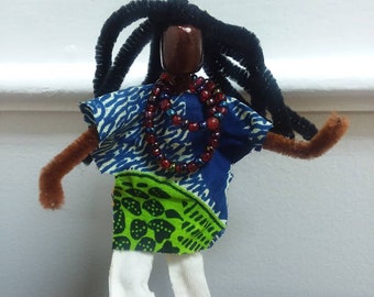 Miniature reggae man with dreadlocks