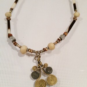 SALE beautiful one of a kind circa 1990&#39;s horn stone and bone african ethnic necklace with hammered wire desgin