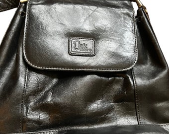 Stunning DK Dior 78 vintage 1970’s black leather designer draw string purse