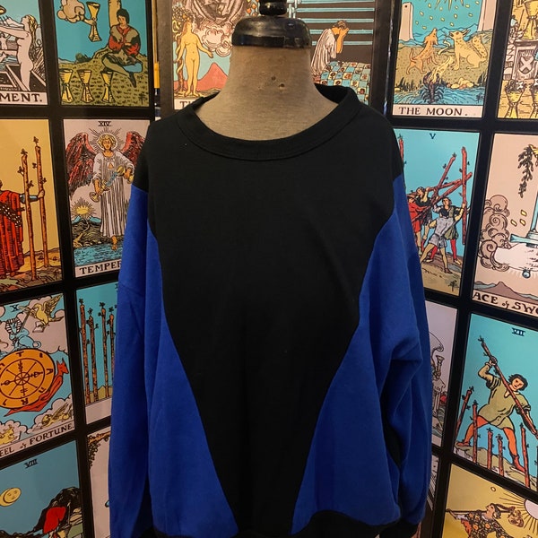 Stunning  glamorous black and blue vintage batwing pullover sweatshirt.