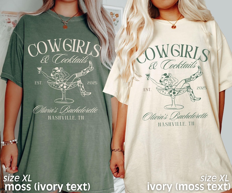 May include: Two oversized t-shirts featuring a cowgirl in a martini glass design. The text on the shirts reads "Cowgirls & Cocktails" with the years "EST. 2025". One shirt is moss green with ivory text and the other is ivory with moss green text. Both shirts say "Olivia's Bachelorette Nashville, TN".