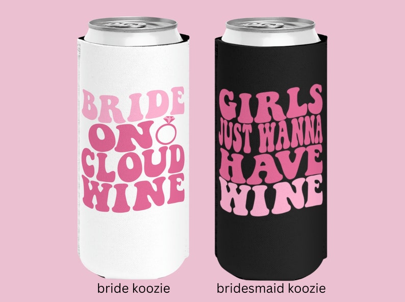 May include: Two white and black can koozies with pink text. The white koozie says "Bride on Cloud Wine" with a pink diamond ring. The black koozie says "Girls Just Wanna Have Wine".