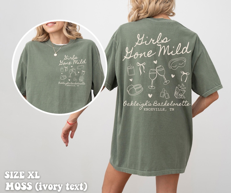 May include: Green t-shirt with the text "Girls Gone Mild" and a design of glasses, a sleep mask, and other hen party items. The text "Oakleigh's Bachelorette Knoxville, TN" is also on the shirt.
