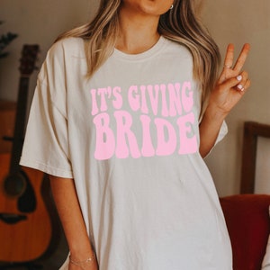 Gift for Bride, Funny Bride Shirt, Engagement Gift, Its Giving Bride, Retro Groovy Bride Tee, Funny Bride gift, Bachelorette Gift for Bride Ivory