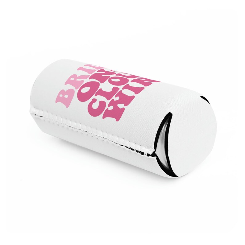 May include: White can cooler with a pink graphic that says "Bring on the good times".