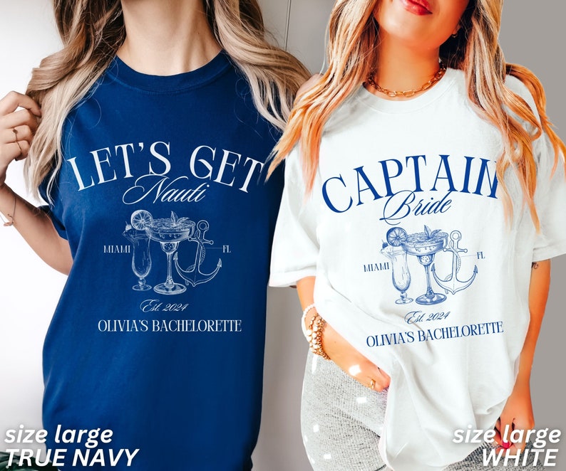 May include: Two t-shirts, one navy blue and one white, with nautical designs. The navy shirt has the text "LET'S GET Nauti" with a cocktail, anchor, and text "Miami, FL, Est. 2024, Olivia's Bachelorette." The white shirt says "CAPTAIN Bride" with similar graphics and text.