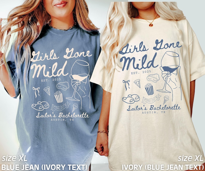 May include: Two oversized t-shirts with the text "Girls Gone Mild" and a wine glass graphic. The text "EST. 2025" and "Sailor's Bachelorette Austin, TX" are also included. One shirt is blue jean with ivory text and the other is ivory with blue jean text.