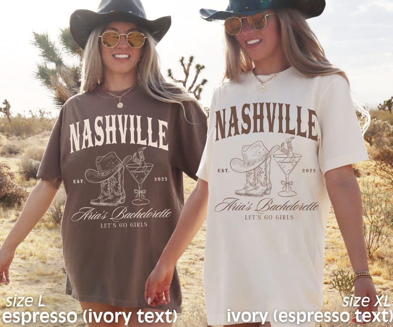 May include: Two t-shirts, one espresso and one ivory, with the word "NASHVILLE" arched across the top. Below, a cowboy hat, boots, and a cocktail glass are printed. The text "Aria's Bachelorette" and "LET'S GO GIRLS" are also visible.
