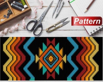 May include: A colourful geometric pattern with a black background. The pattern features a central diamond shape with smaller diamonds inside. The pattern is surrounded by a border of zigzags.