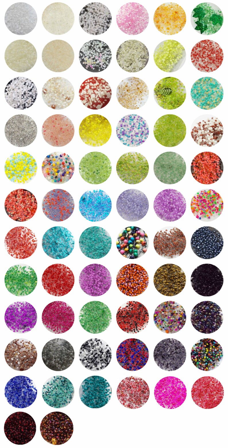 May include: Assortment of colourful seed beads in various shapes and sizes. The beads are displayed in small, round containers.