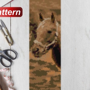 May include: A beaded pattern of a brown horse's head with a bridle. The pattern is on a white background with the word "Pattern" in red.
