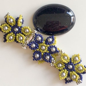 Pulsera con cuentas - Margaritas de primavera - Semillas y perlas