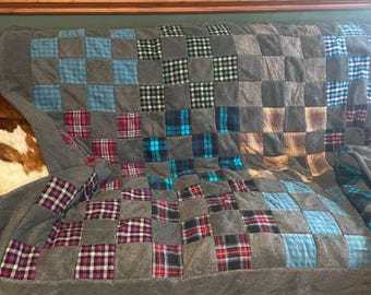 Fleece and flannel large 16 patch multi color throw.
