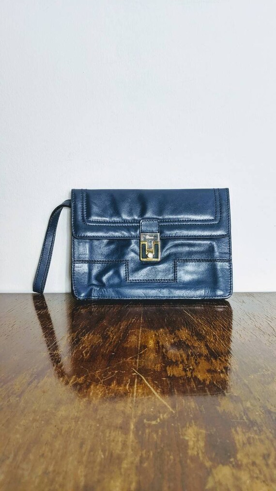 navy leather clutch bag