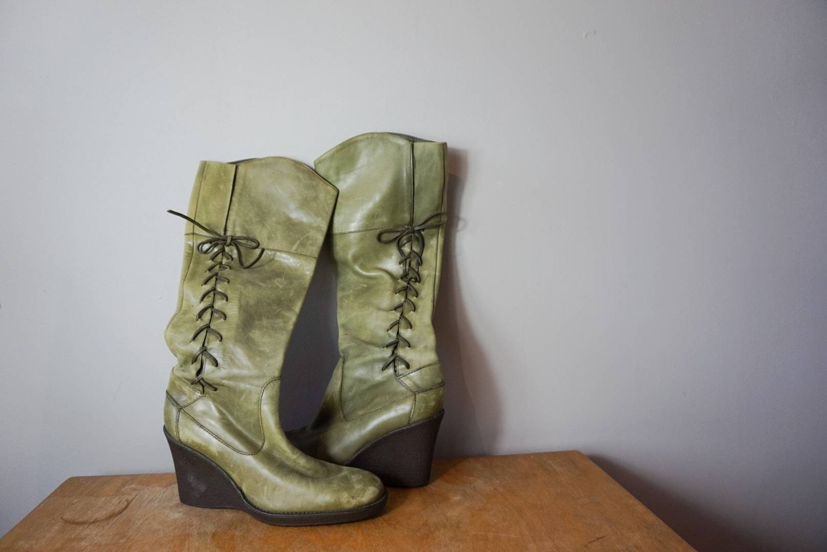 green wedge boots