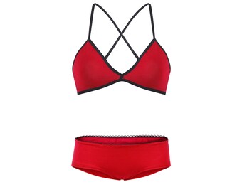 May include: Red lingerie set with a black trim. The bra has a criss-cross strap design and the underwear has a lace trim.