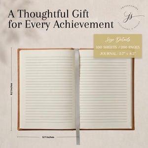 May include: An open journal with tan covers and lined white pages, featuring a gray ribbon bookmark. Text reads: A Thoughtful Gift for Every Achievement, Size Details 100 SHEETS / 200 PAGES, JOURNAL: 5.7 inches by 8.2 inches.