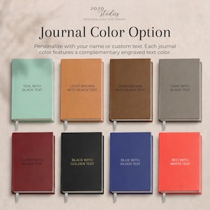 May include: Eight rectangular journals arranged in two rows, featuring colors including teal, light brown, dark brown, gray, claret, black, blue, and red. Each journal displays text indicating its specific color and the color of the engraved text.