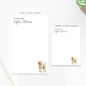 May include: Two white notepads with the text "A NOTE FROM Sophie Stevens" in black script. The larger notepad is 5.5W x 8.5H inches, and the smaller is 4.25W x 5.5H inches. A watercolor illustration of a goldendoodle dog is at the bottom.