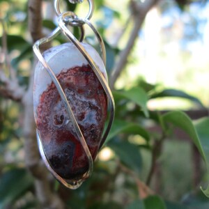 Crazy Lace Agate Spiral Cage Pendant Necklace
