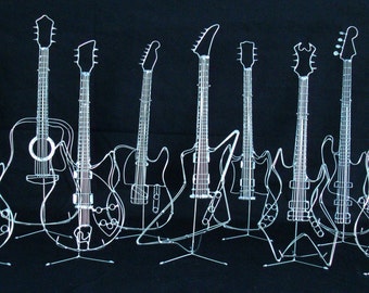 Mini Masterpieces for Music Makers and Collectors - Perfect Gifts for Every Guitar Lover!