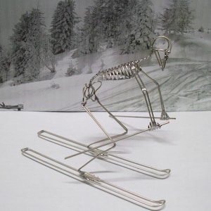 Unique and Unusual Gifts for All SKIERS and SNOWBOARDERS. Celebrate the thrill of the slopes with these expertly handcrafted wire gifts.