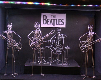 For all BEATLES Fans - collect each member and form your own Beatles tribute band!