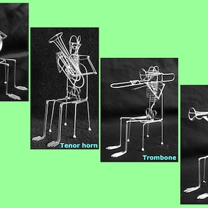 May include: Four wire sculptures of musicians playing different instruments. The musicians are seated on chairs and are holding their instruments. The instruments are a French horn, a tenor horn, a trombone, and a trumpet. The sculptures are made of silver wire and are set against a black background.