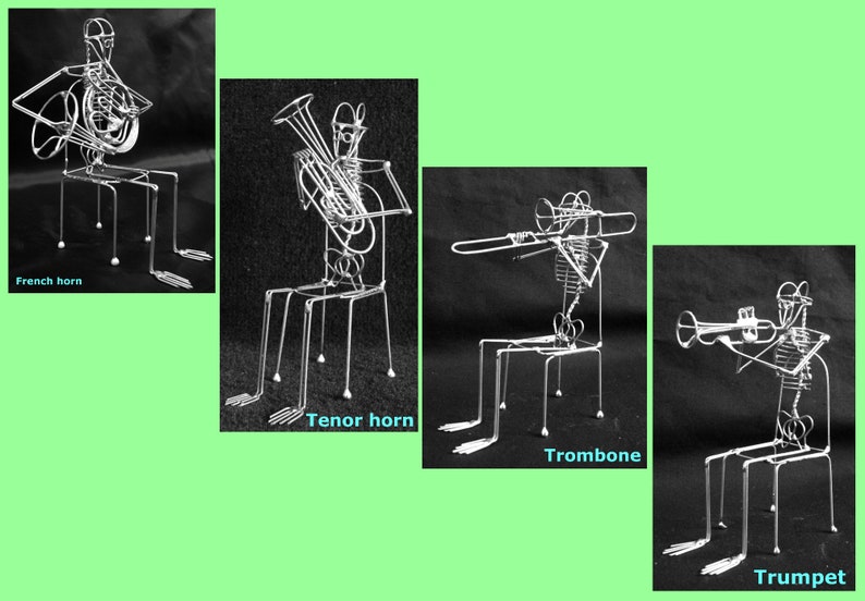 May include: Four wire sculptures of musicians playing different instruments. The musicians are seated on chairs and are holding their instruments. The instruments are a French horn, a tenor horn, a trombone, and a trumpet. The sculptures are made of silver wire and are set against a black background.