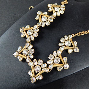 Glamorous Rhinestone Necklace with Brilliant Round Teardrop and Oval Crystal Rhinestones in Gold Tone V  Shape Links Vintage Jewelry