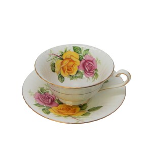 Paragon English Teacup and Saucer Footed Fine Bone China Pink and Yellow Roses By Appointment Her Majesty The Queen Vintage 1950s