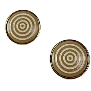 May include: Two round earrings with a concentric circle design. The earrings have a gold-colored border and a tan background with cream-colored circles. The earrings are set against a white background.