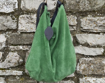Handmade green suede hobo bag with black leather shoulder belt