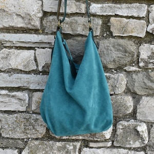 Handmade turquoise suede hobo bag