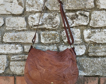 Tan leather crossbody bag