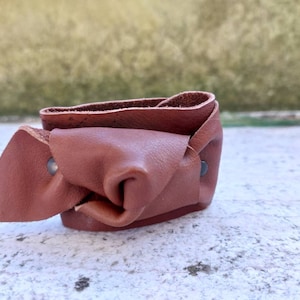 Knot suede beige bracelet