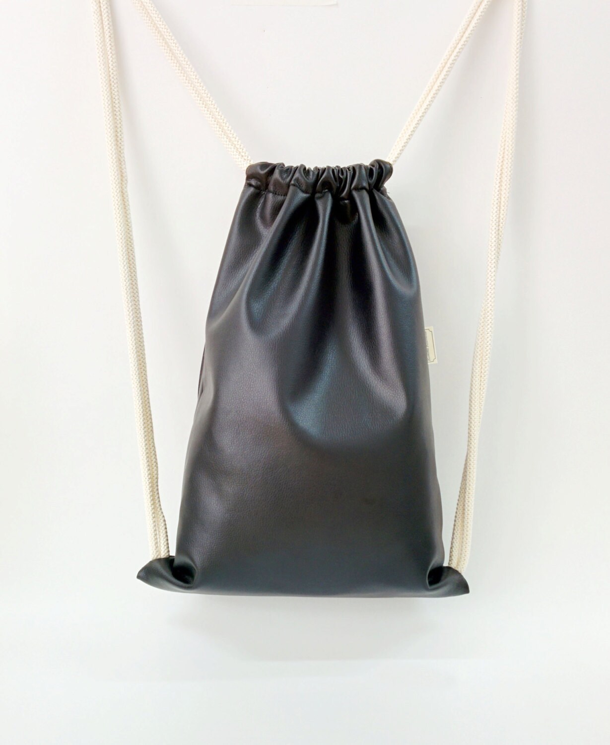 leather string backpack