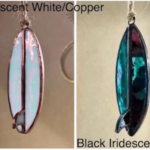 May include: A rustic wooden sign with the text "Welcome to our home" in a handwritten style. The sign has a distressed finish and a simple, inviting design, ideal for entryway decor.