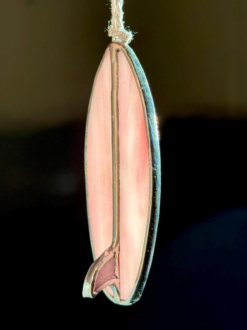 May include: A distressed wooden sign, reading "Welcome to our home" in white lettering. The sign has a rustic finish, ideal for adding a welcoming touch to any home's entrance.