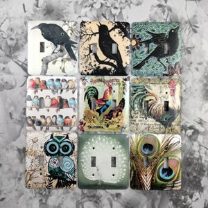 May include: Set of ten decorative light switch covers featuring various designs, including birds, roosters, and peacocks. The covers are printed with vintage-inspired illustrations and have a white background.