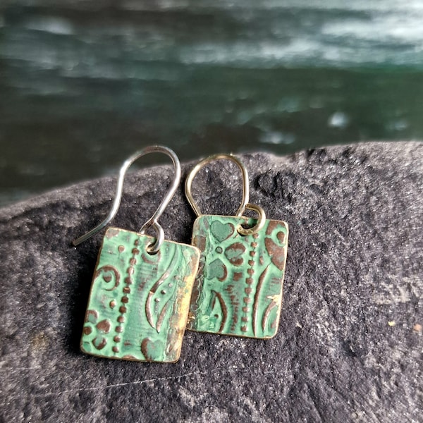 Rustic, upcycled brass with verdigris green patina. Textured patterned drop dangle earrings dangle earrings. Small rectangle. Artisan made