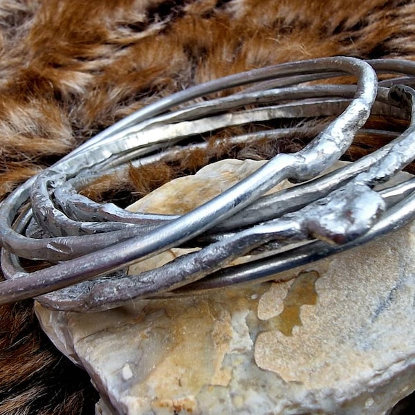 Rustic aluminium warrior tribal style stacking bangles. Silver bangles. Raw rough arm bangles  Hidden Storm collection.